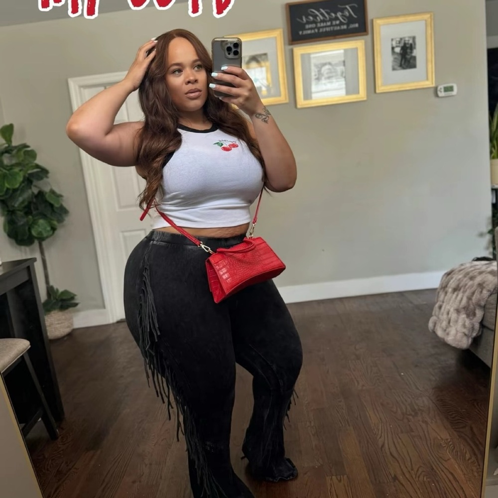 Red Crossbody Bag and Black Fringe Pants